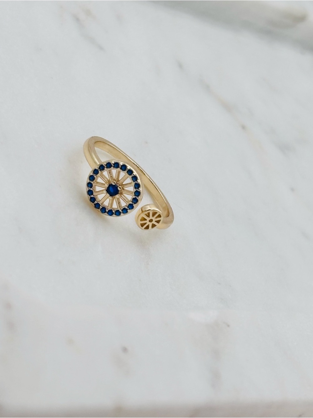 Gold Open Band Ring with Navy Blue Stone Halo